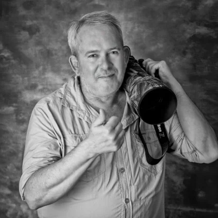 Portrait of photographer Gabriel Haering with camera